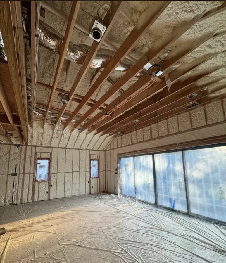 Interior walls and ceiling insulated with spray foam during new construction in Wethersfield